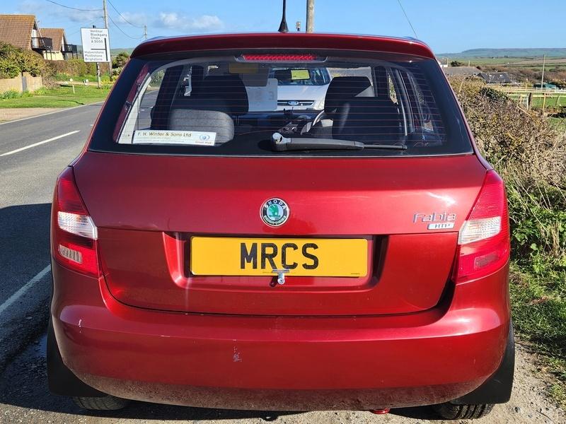 A red Skoda Fabia HTP 1 viewed from the back