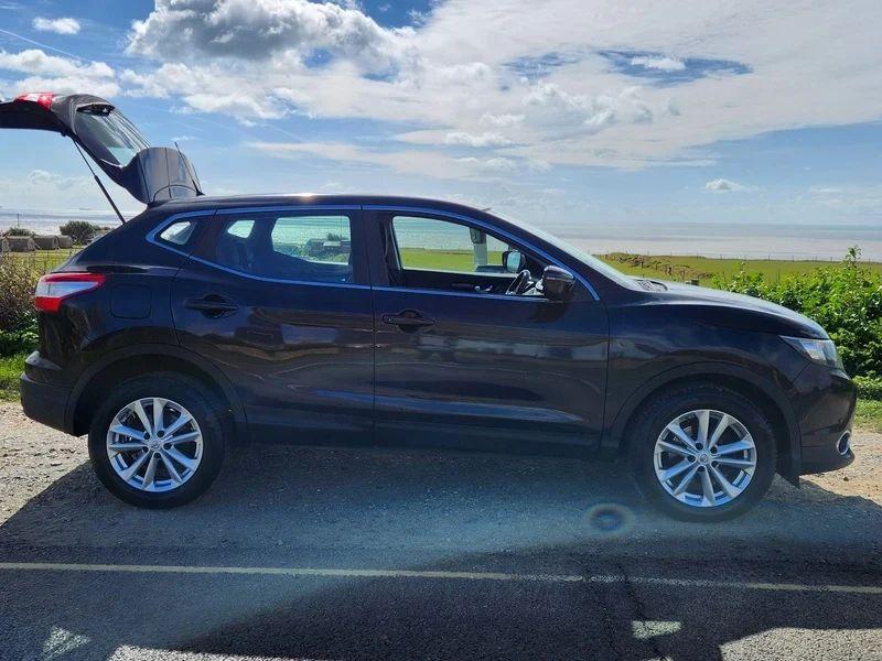 A Magnetic Black Nissan Qashqai viewed from the driver side
