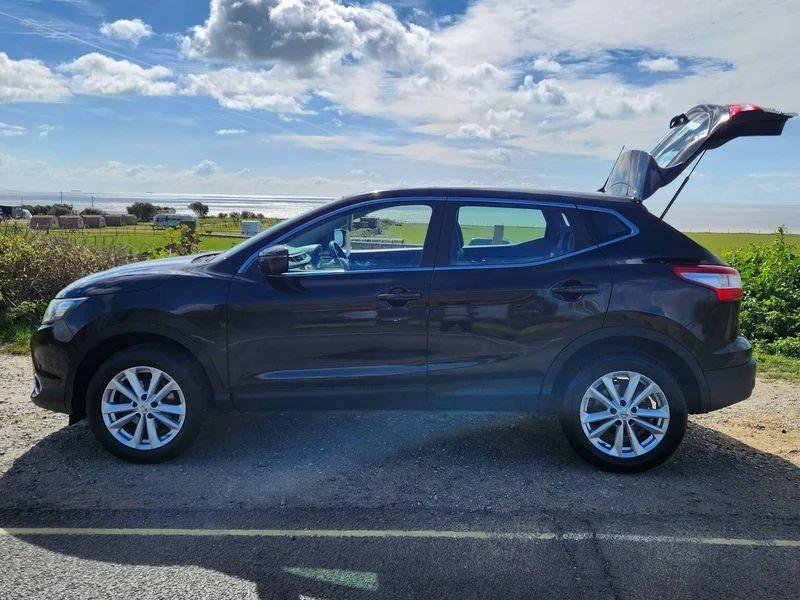 A Magnetic Black Nissan Qashqai viewed from the passenger side