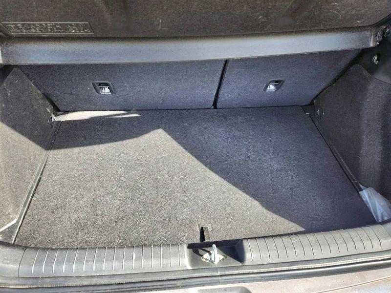 The open boot of a Mystic Blue Metallic Hyundai i20 viewed from the back