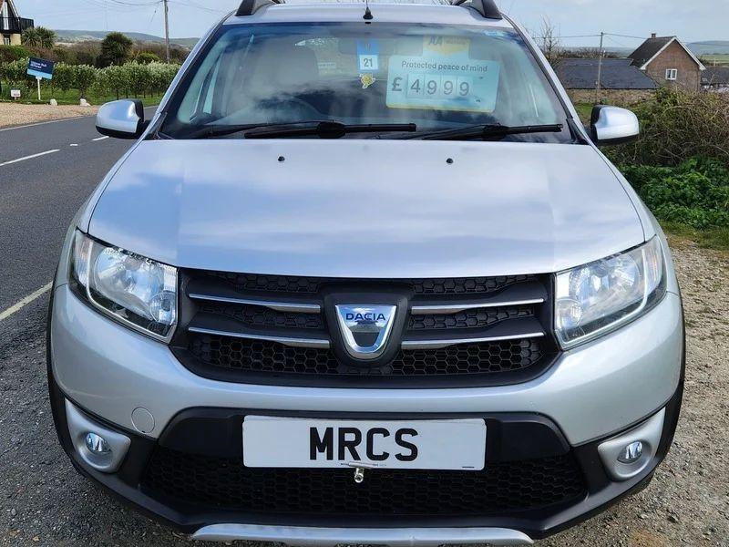 A Platinum Silver Metallic Dacia Sandero Stepway viewed from the front