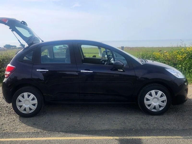 A Citroen C3 in Midnight Blue Metallic viewed from the driver side