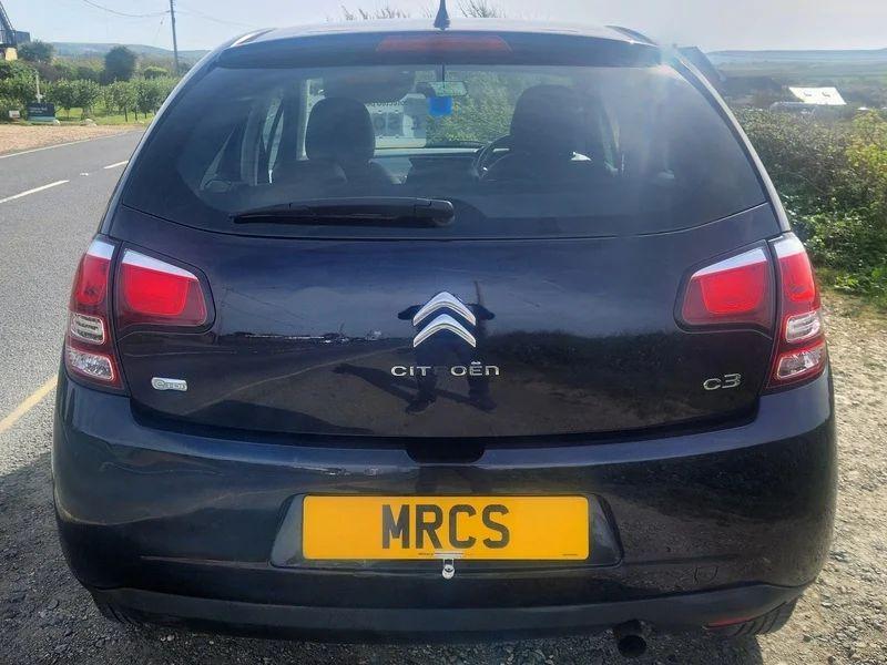 A Citroen C3 in Midnight Blue Metallic viewed from the back