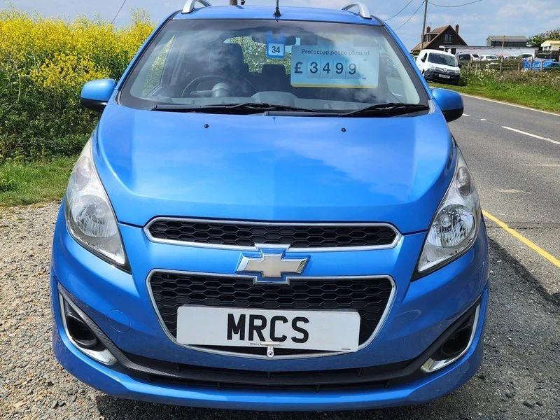 A blue Chevrolet viewed from the front