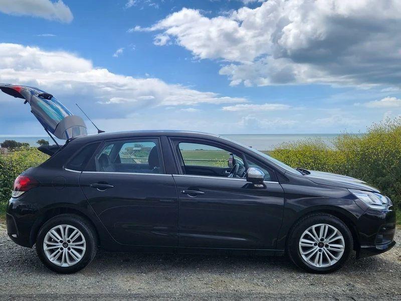 A black Citroen C4 viewed from the driver side