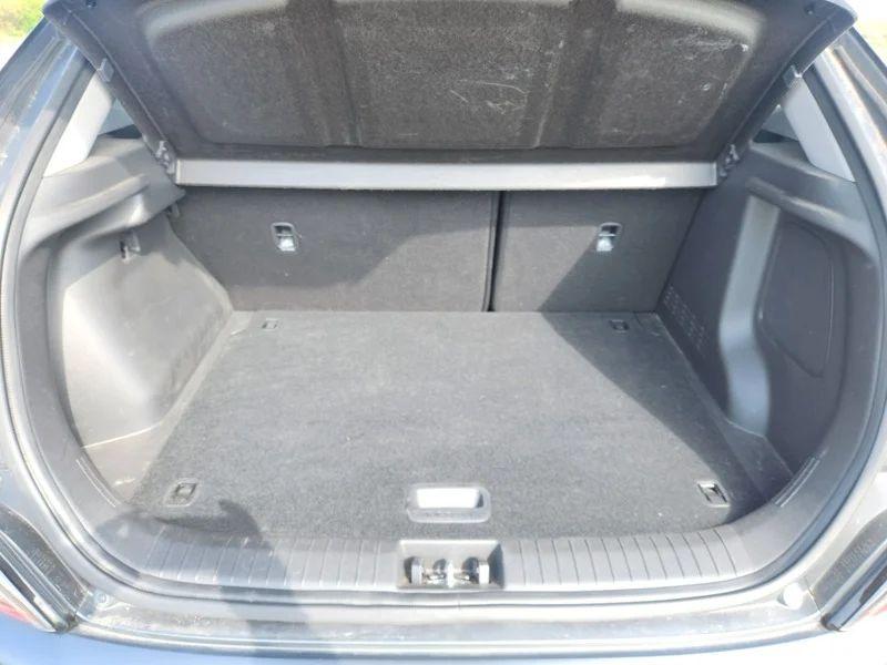 The open boot of a black Hyundai Kona viewed from the back