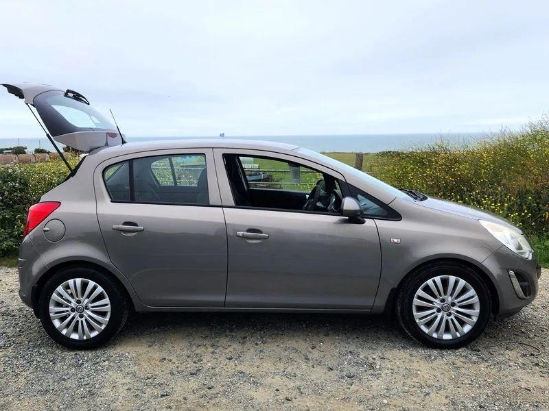 A pepperdust Vauxhall Corsa viewed from the driver side