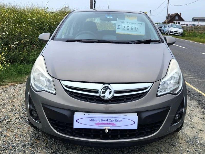 A pepperdust Vauxhall Corsa viewed from the front