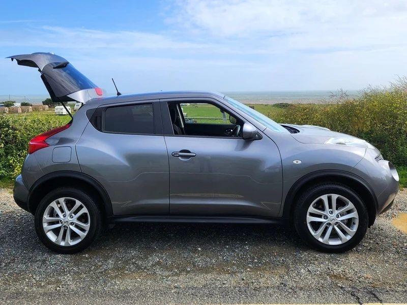 A grey Nissan Juke viewed from the driver side