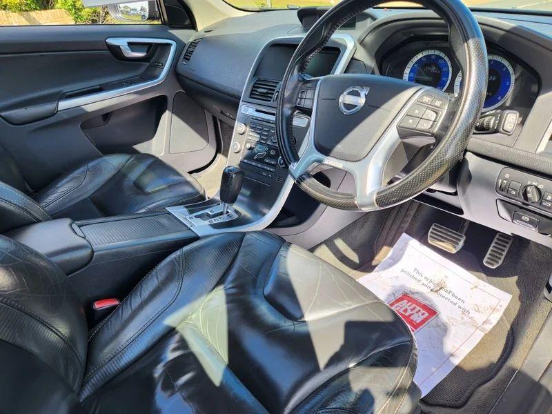 The steering controls of a black Volvo XC60 viewed from above the driver seat