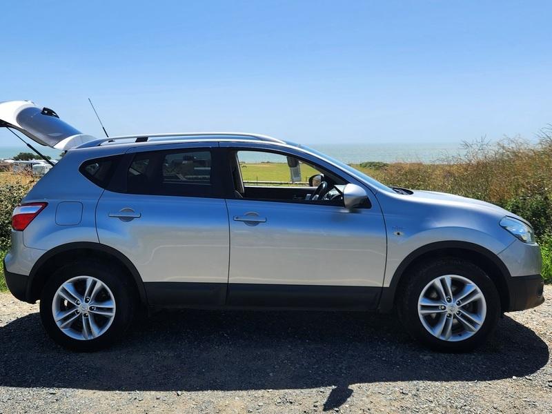 A silver Nissan Qashqai viewed from the driver side