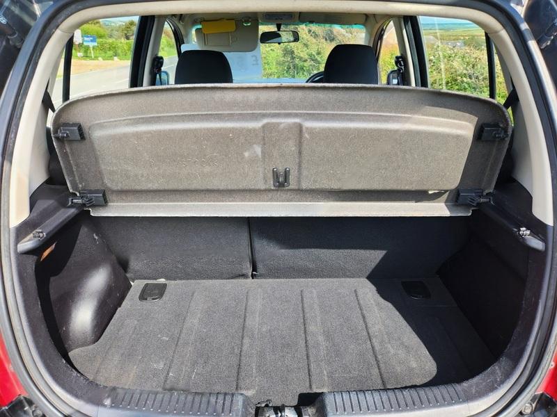 The open boot of a black Hyundai i10 viewed from the back