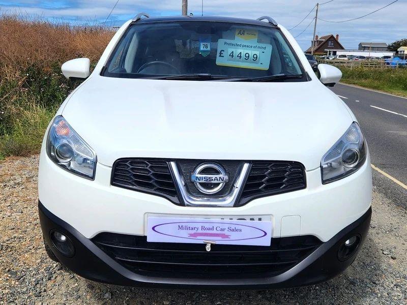 A white Nissan Qashqai viewed from the front
