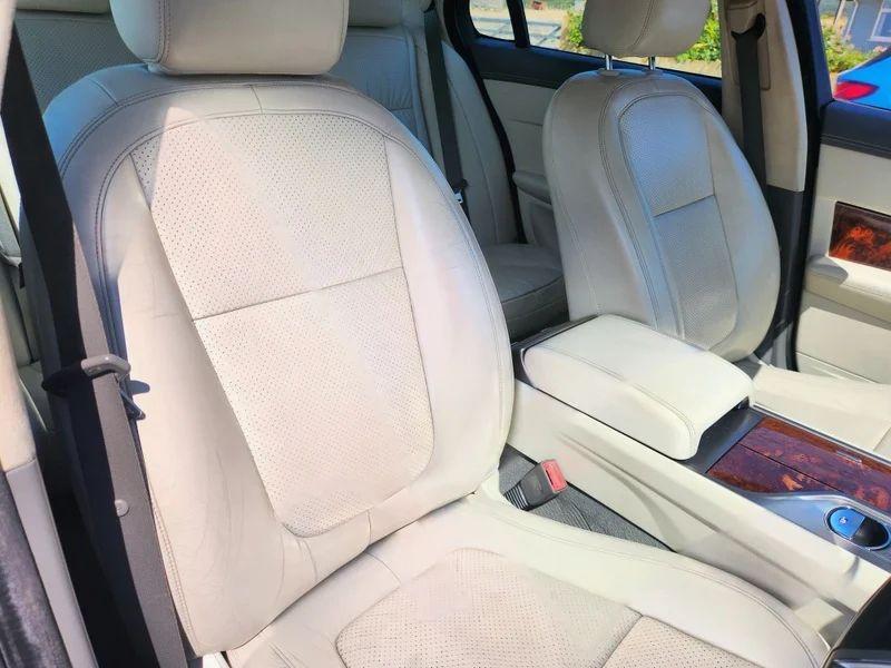 The front seats of a Jaguar XF