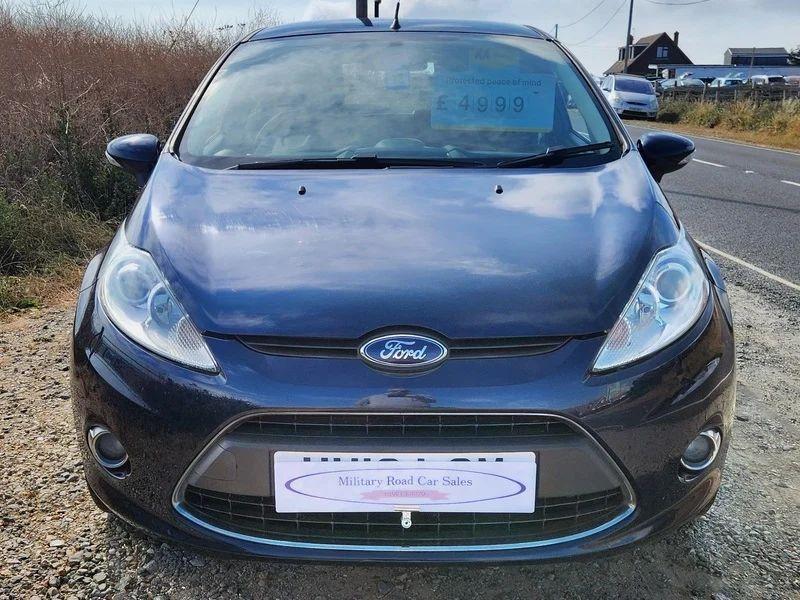 A Deep Midnight Blue Ford Fiesta viewed from the front