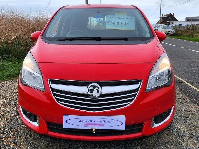 A Magma Red Solid Vauxhall Meriva viewed from the front