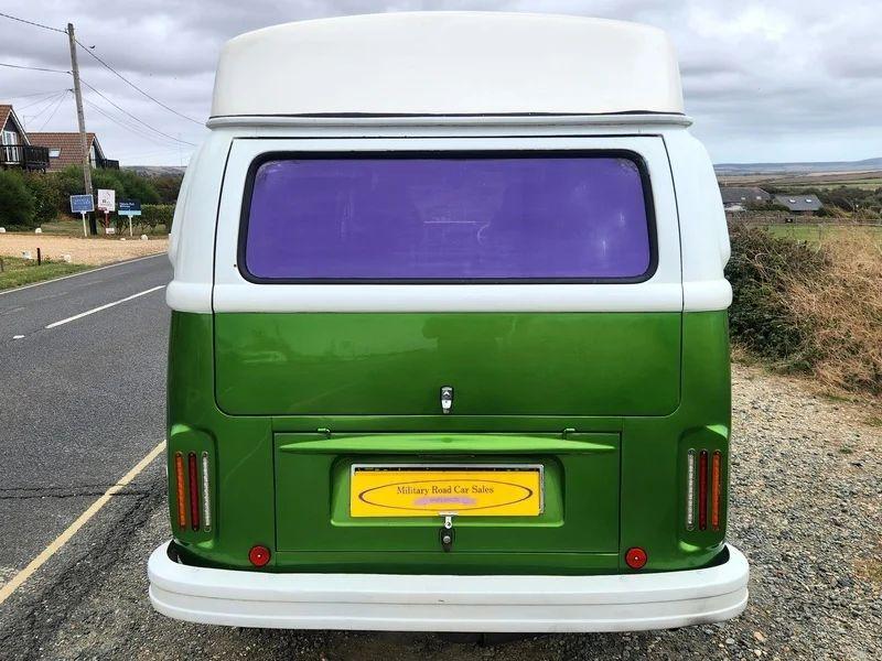 A Volkswagen Camper Van viewed from the back