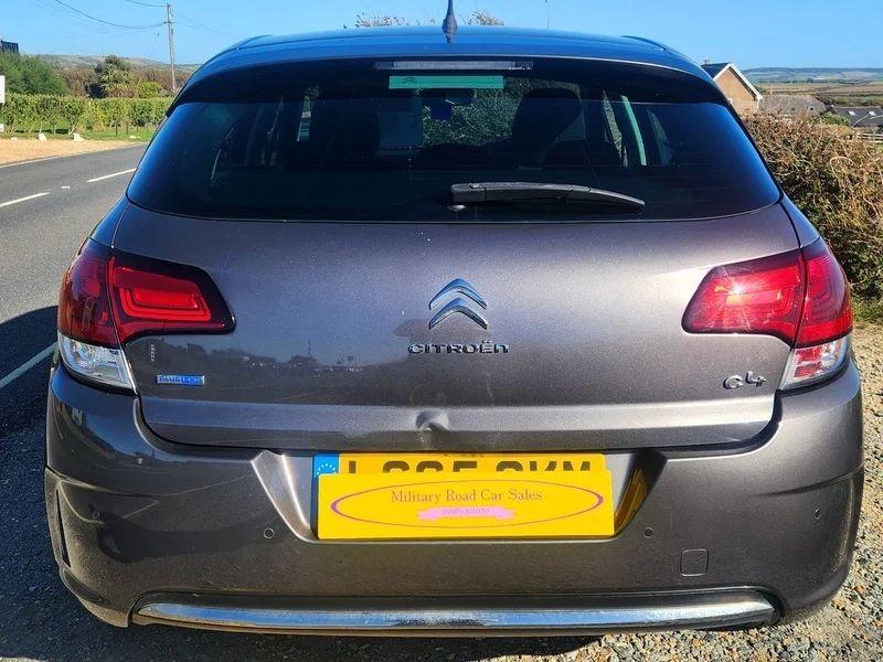 A Shark Grey Metallic Citroen C4 viewed from the back