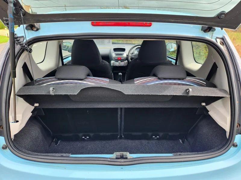 The open boot of a Botticelli Blue Citroen C1 viewed from the back