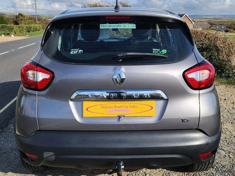 A grey Renault Captur viewed from the back