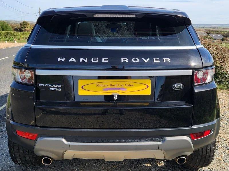 A Santorini Black Range Rover viewed from the back