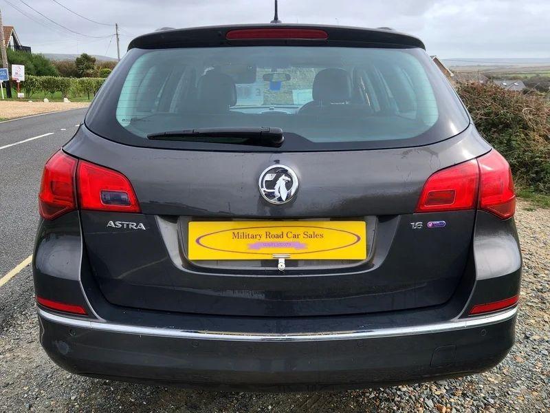 A Grey Vauxhall Astra viewed from the back